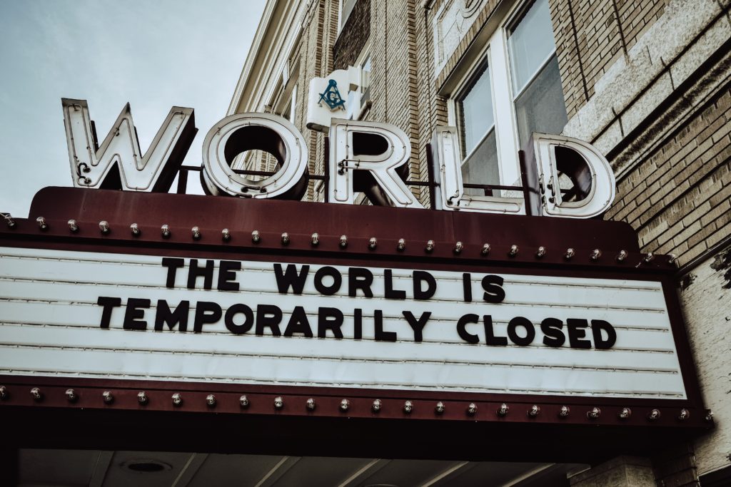 Unsplash photo by Edwin Hooper - red and white UNKs restaurant - signage for when the world is temporarily closed